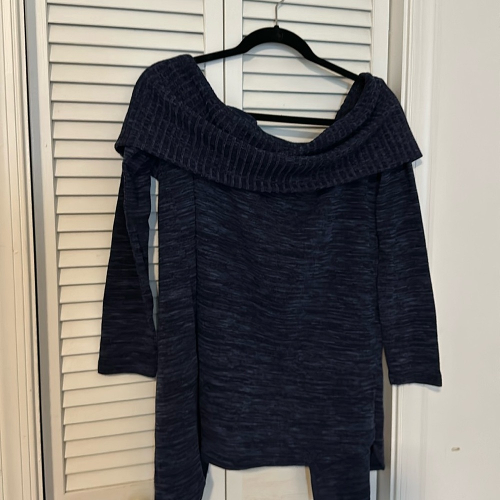 Blue sweater with open in the back
